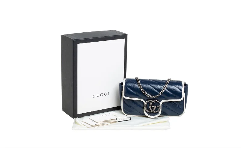 Ladies Gucci Dionysus bags in a pastel colorGUCCI GG MARMONT MINI CALFSKIN TORCHON BAG