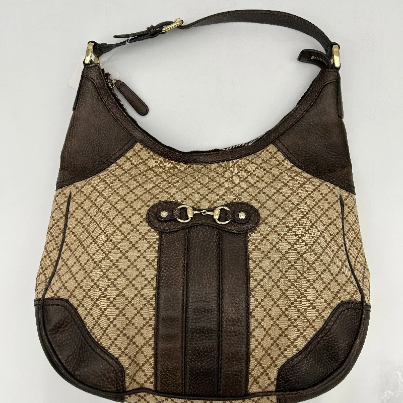 Women Gucci bags with interlocking G hardware for a classic lookGucci Catherine Brown Cloth Handbag