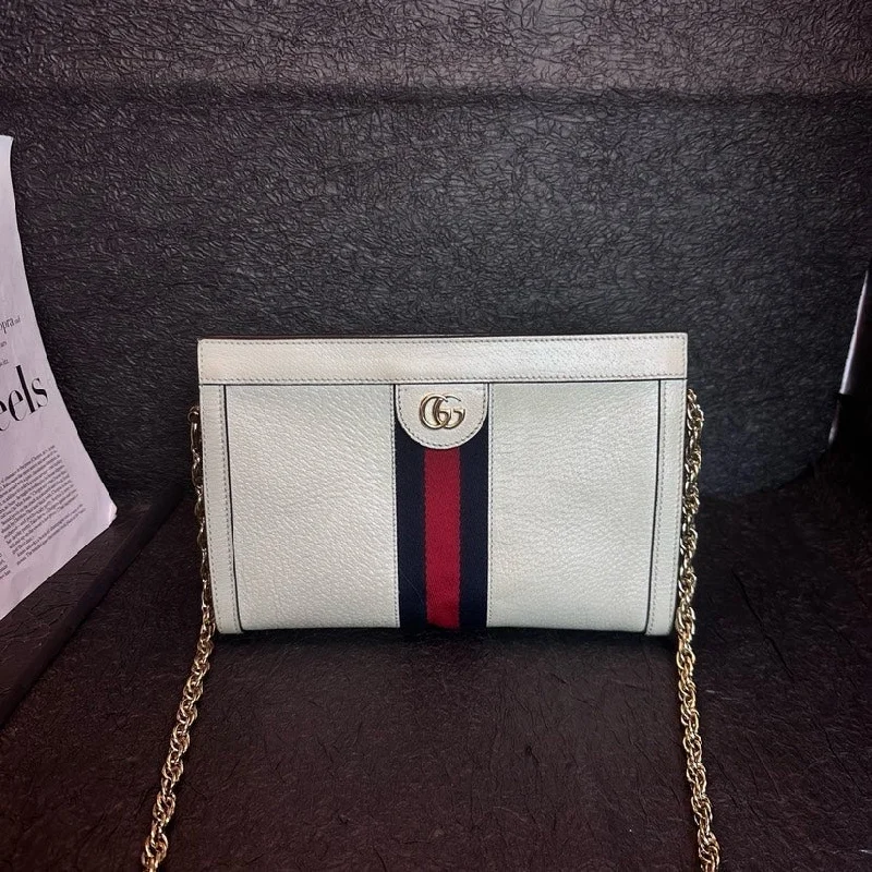 Women Gucci Sylvie bags with a monogram - embossed leatherGucci Cream White Leather Clip Bag 25cm