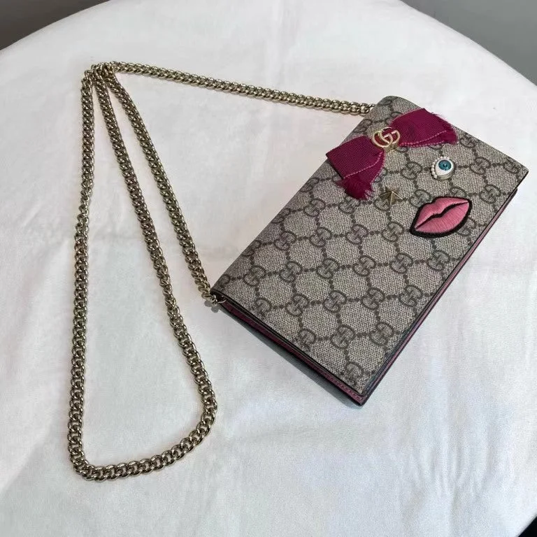 Gucci backpacks for women with a sleek silhouetteGucci GG Monogram Beige Face Embroidered Chain Wallet