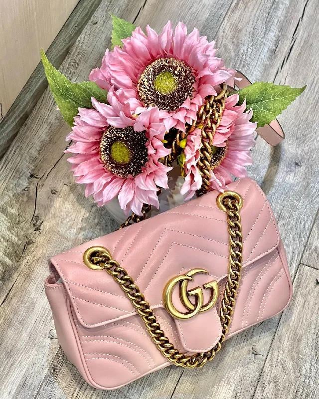 Ladies Gucci shoulder bags with a tassel decorationGUCCI CALFSKIN LEATHER MATELASSE MINI GG MARMONT SHOULDER BAG