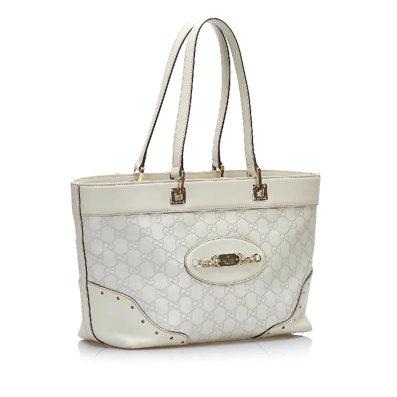 Ladies Gucci shoulder bags with a magnetic - closure flapGucci Guccissima Punch Tote (SHG-famjfI)