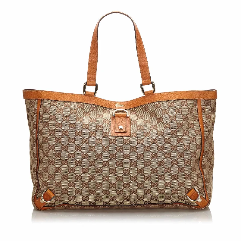 Women Gucci Sylvie bags with a crystal - embellished web stripeGucci Brown Beige Canvas Fabric GG Abbey D Ring Tote Bag Italy