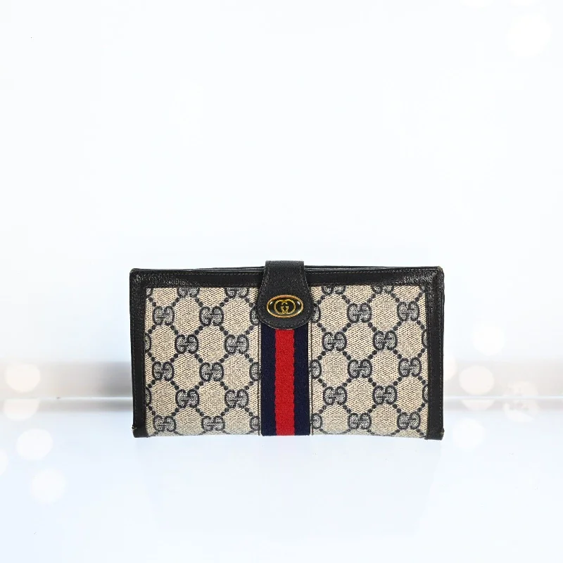 Women Gucci Sylvie bags featuring the signature web stripeGucci Gg Pvc Leather Long Wallet Navy