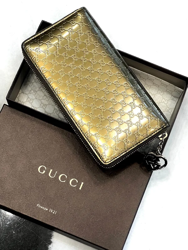 Women Gucci bags with a zippered interior pocketGUCCI METALLIC MICROGUCCISSIMA ZIP AROUND WALLET