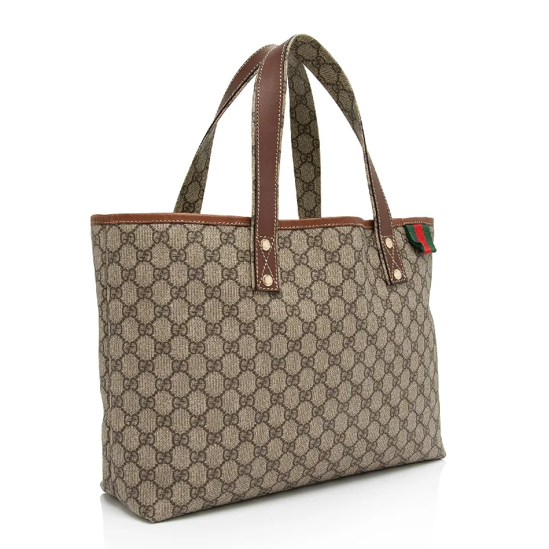 Women Gucci bags with a chain - link trim and a leather bodyGucci GG Supreme Signature Web Loop Medium Tote (SHF-ll8U5X)