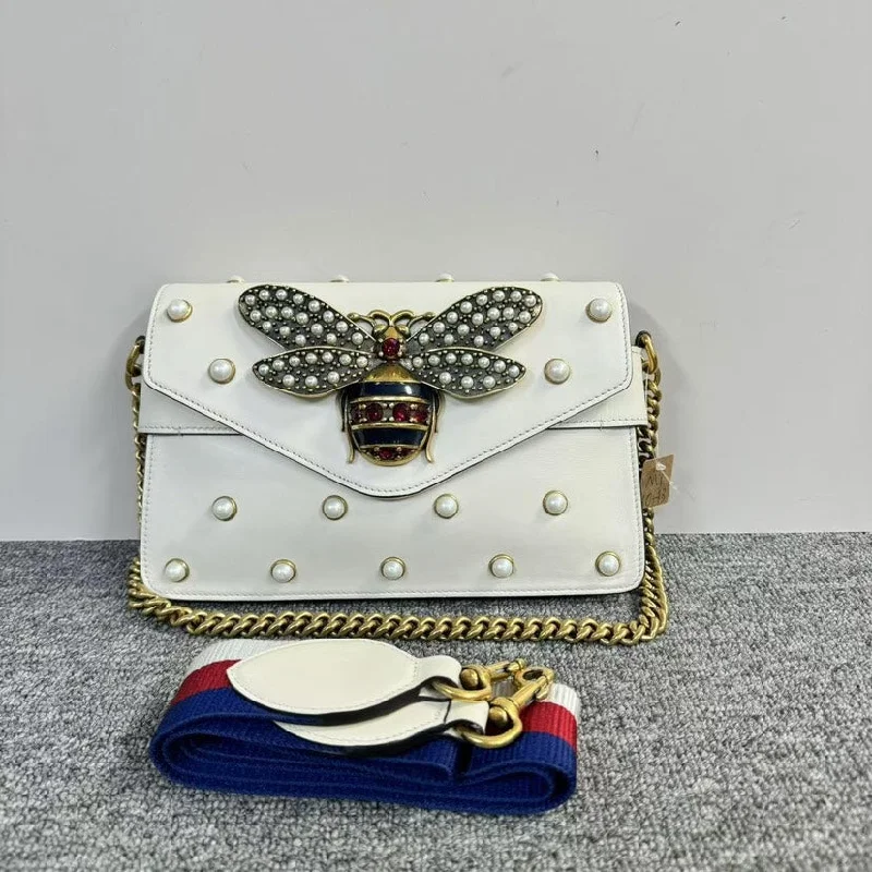 Women Gucci crossbody bags with a keychain holderGucci Broadway Bee White Pearl Embellished Leather Shoulder Bag