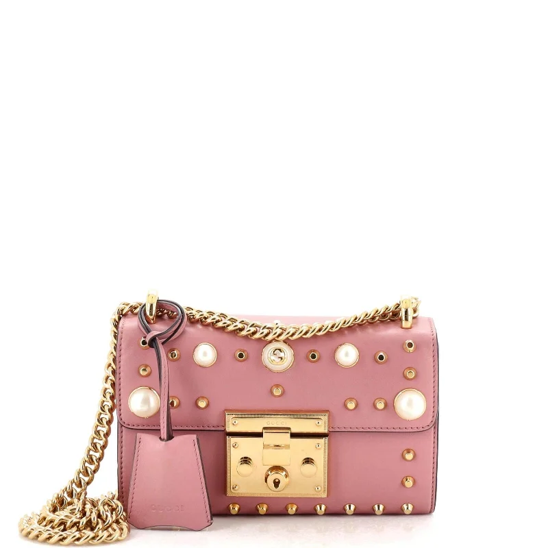 Ladies Gucci Dionysus bags in a pastel colorGucci Pearly Padlock Shoulder Bag