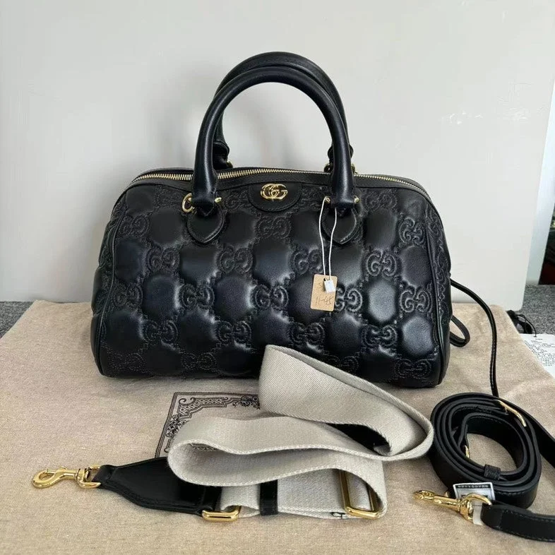 Ladies Gucci Dionysus bags with a star - shaped charmGucci Black Leather Embossed Two-Way Bag Medium