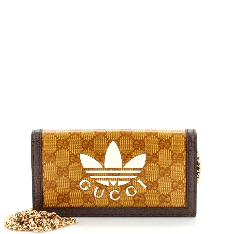 Women Gucci Sylvie bags featuring the signature web stripeGucci X Adidas Wallet On Chain Gg Coated