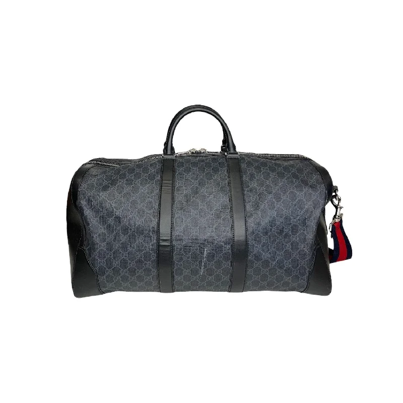 Women Gucci bags with interlocking G hardware for a classic lookGucci GG Supreme Carry-On Duffle Bag