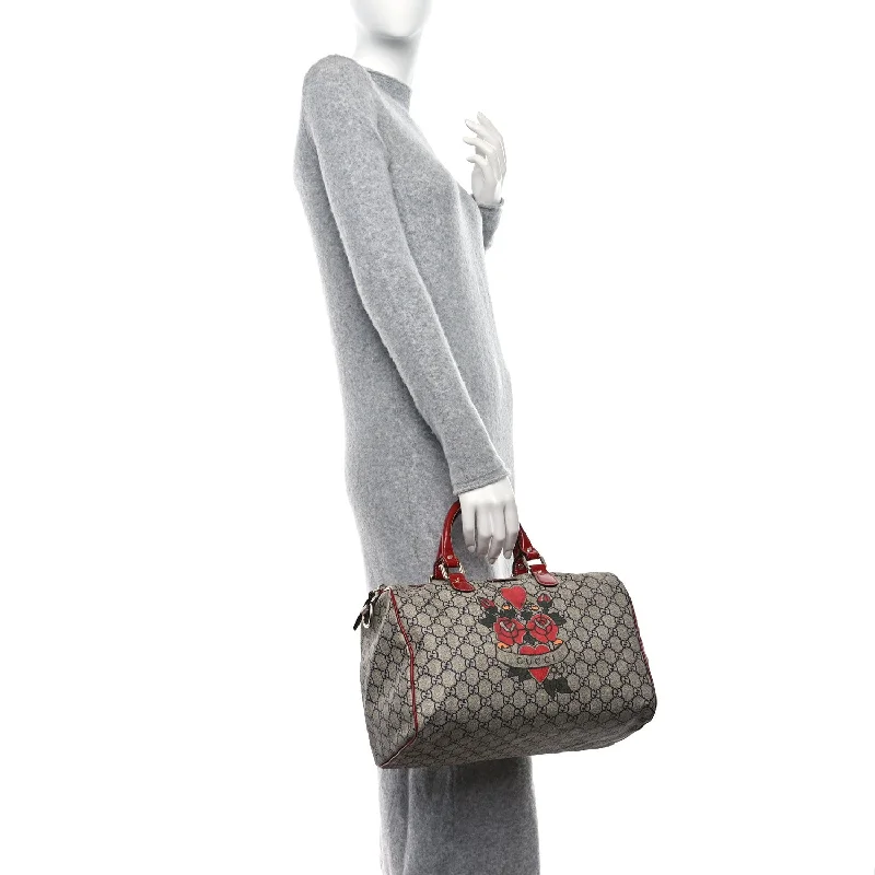 Women Gucci Sylvie bags with a crystal - embellished web stripeGucci Gg Plus Tattoo Heart Medium Joy