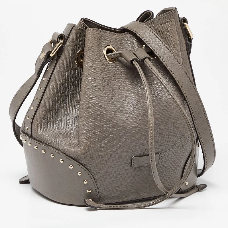 Women Gucci Sylvie bags featuring the signature web stripeGucci Grey Diamante Leather Medium