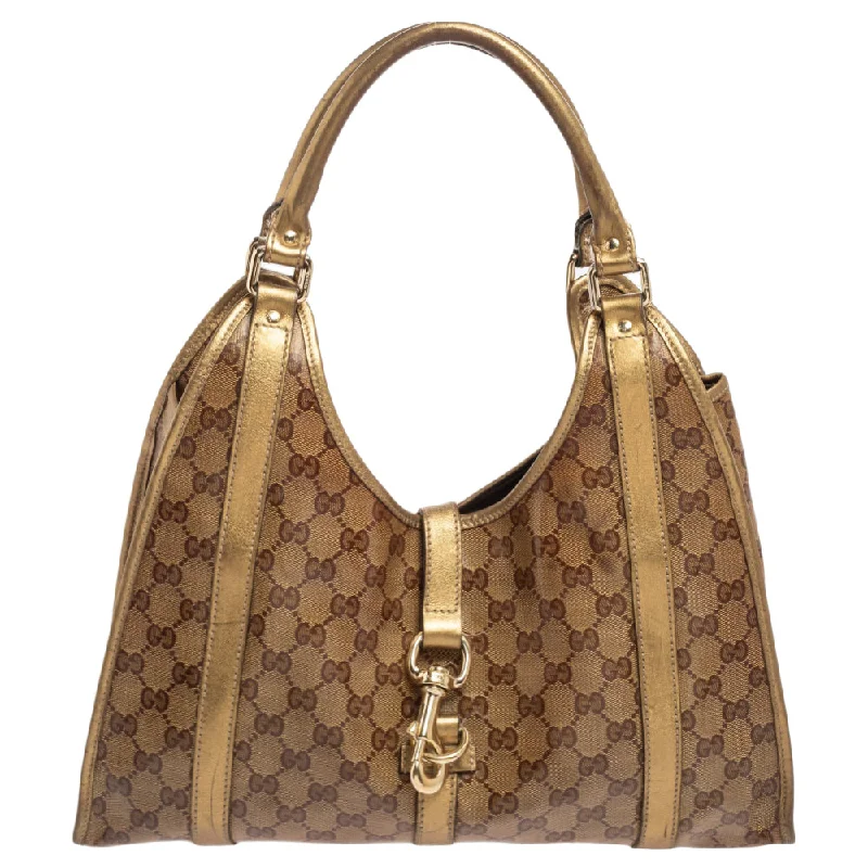 Ladies Gucci Dionysus bags with a star - shaped charmGucci Gold/Beige GG Crystal Canvas and Leather Medium Joy Shoulder Bag