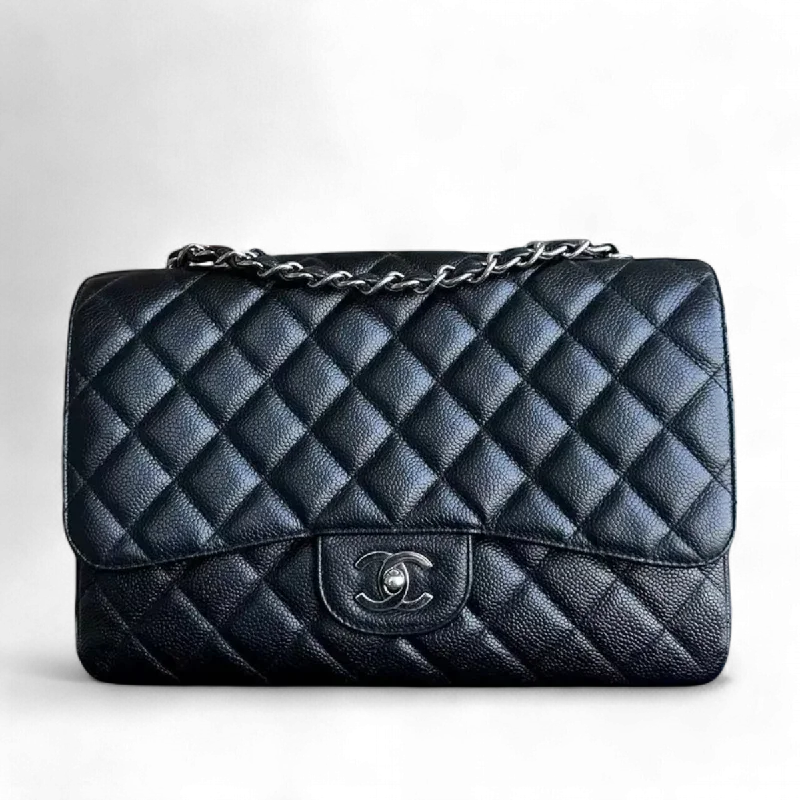 Chanel Vintage Inspired Handbag for Retro LoversCaviar Jumbo Classic Flap Quilted Grained Calfskin Black Silver Hardware Series 12