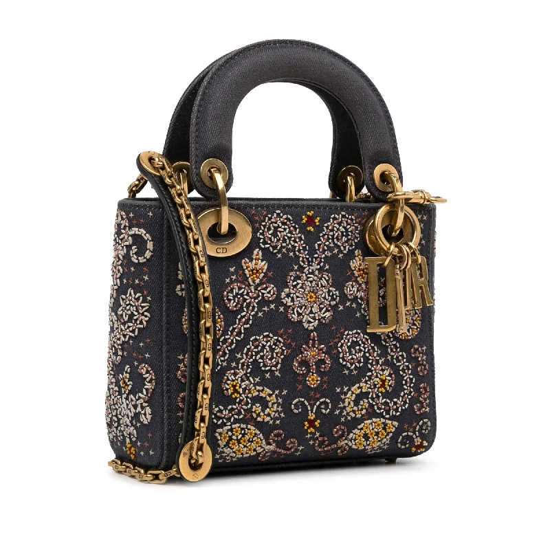 Christian Dior handbags with a snap - button closure and a decorative buckleDior Mini Embroidered Denim Lady Dior (eSDCMM)