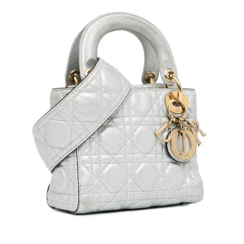 Christian Dior backpacks with a sleek, minimalist silhouetteDior Mini Lambskin Cannage Lady Dior (VMnf5t)