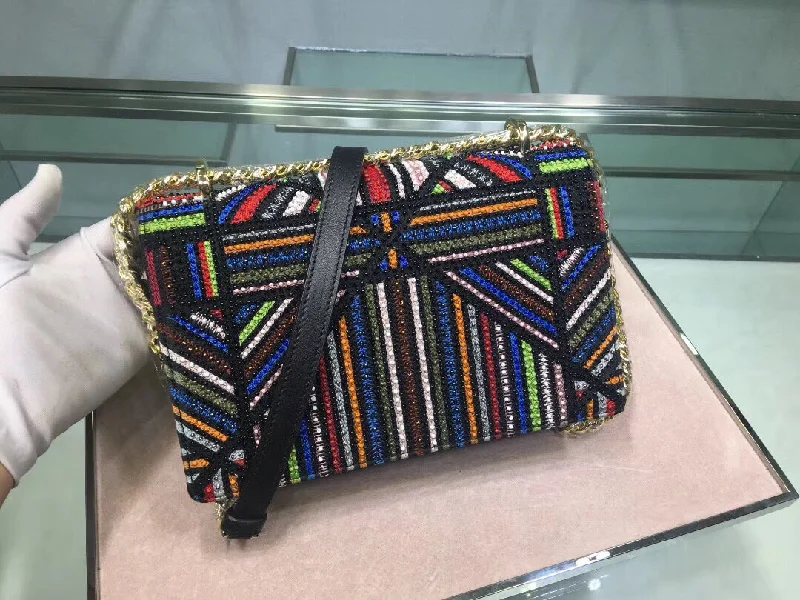 Trendsetting Christian Dior crossbody bags with a colorful strapDior Diorama Canvas Bag Embroidered With Multi-coloured Stripes