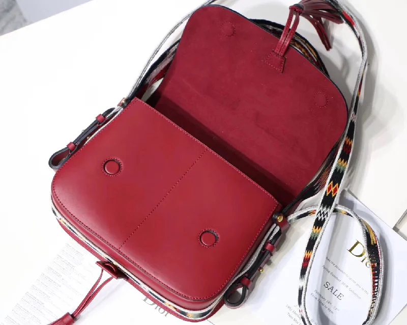 Contemporary Christian Dior handbags with a unique shapeChristian Diorodeo Flap Bag In Red Calfskin