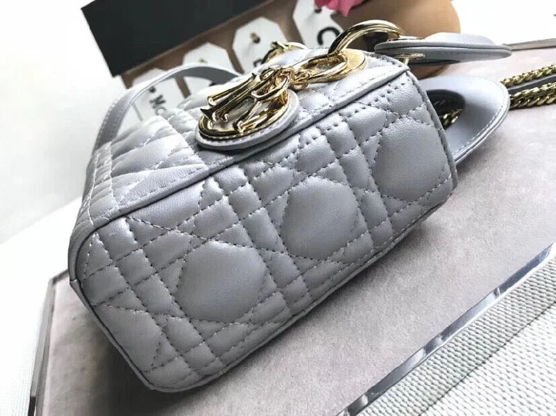 Christian Dior handbags with a snap - button closure and a decorative buckleDior Grey Pearly Lambskin Mini Lady Christian Dior Bag With Chain