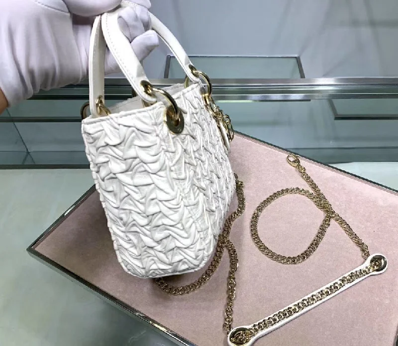 Christian Dior Saddle bags with a studded trim for a bold lookDior Lady Dior Mini Chain Bag In White Wavy Crinkled Lambskin